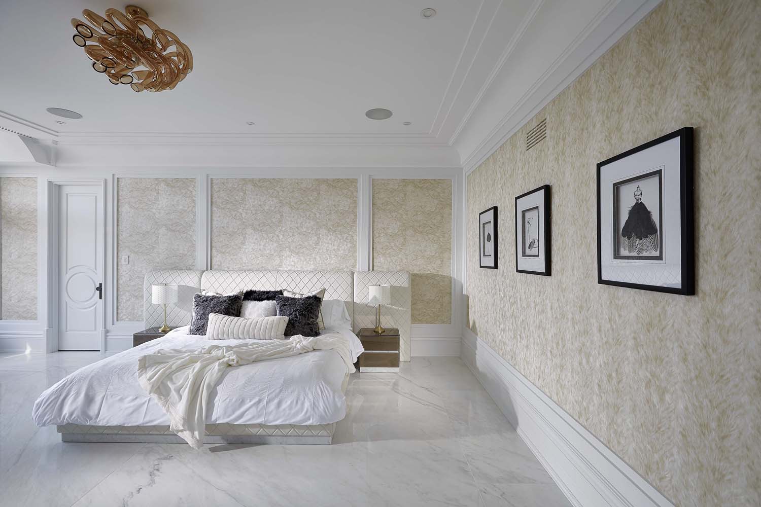 Sculptural lighting over a principal suite
