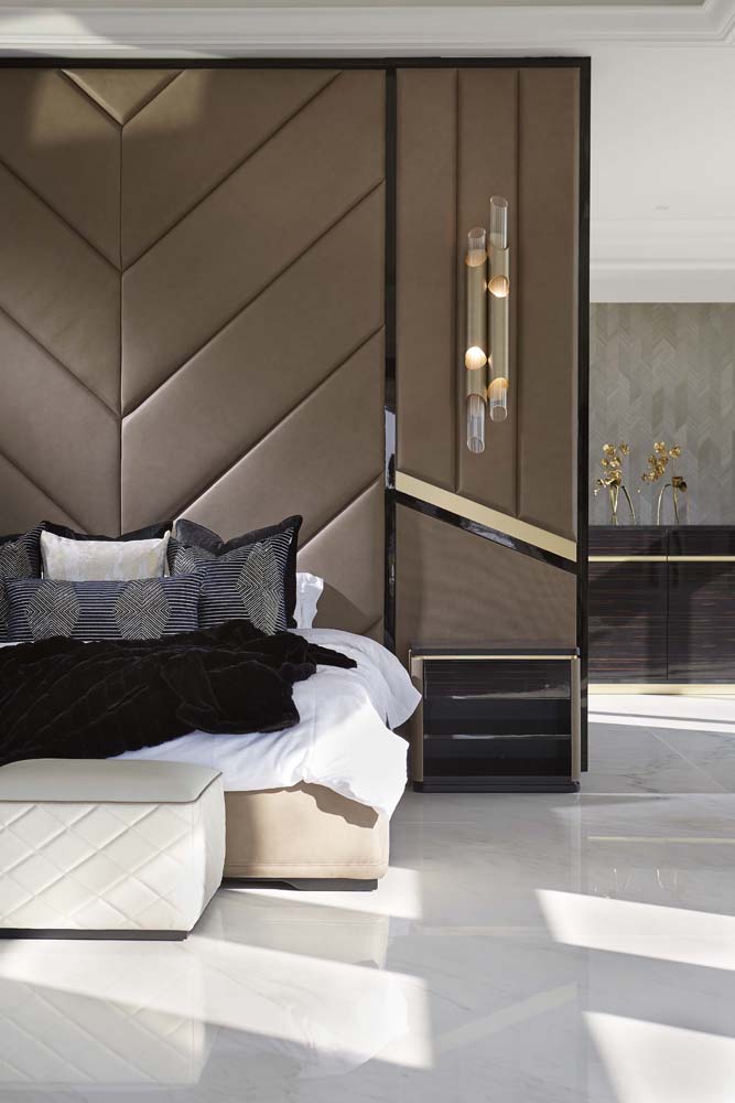 Custom upholstered millwork headboard wall